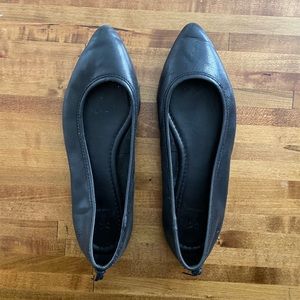 Black leather ballet flats
